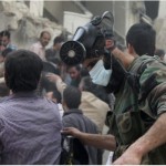 STRINGER / REUTERS FILE PHOTO 

A man with a chemical mask on his head searches for survivors from the rubble of a damaged area, what activists said was a result of an airstrike by the Syrian Regime, in Al-Sukkari neighbourhood in Aleppo April 7, 2013.